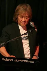 信田かずお