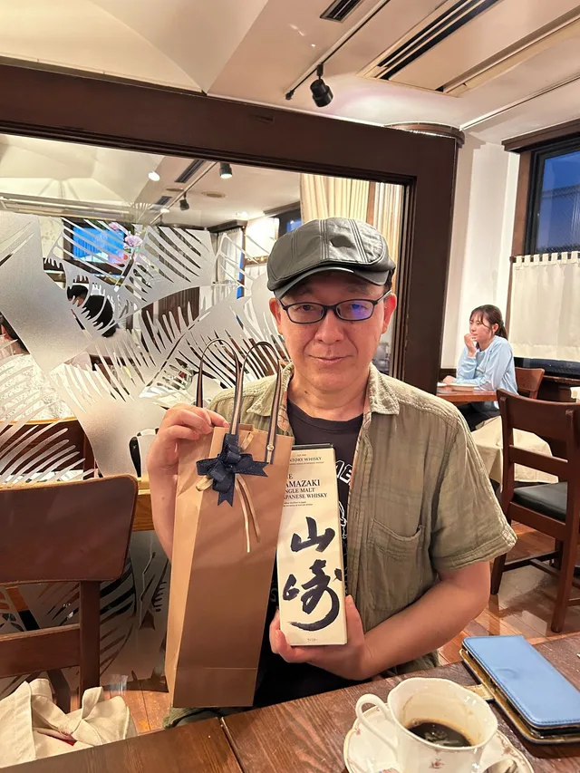 小西贤一