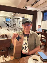 小西贤一