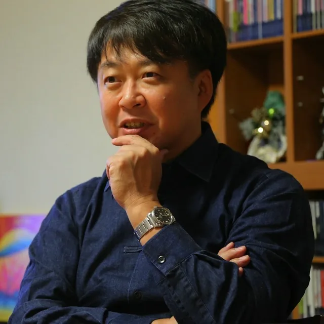 本间昭光